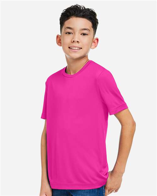 Youth Capital Performance T-Shirt - OnModelSide - B268A7312 - Bright Magenta