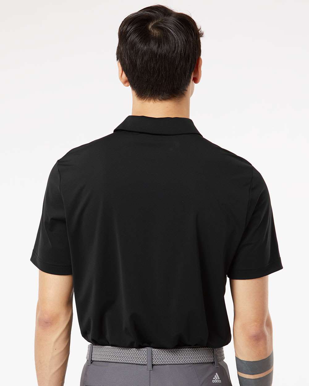 Men's Ultimate Solid Polo - OnModelBack - B05653502 - Black