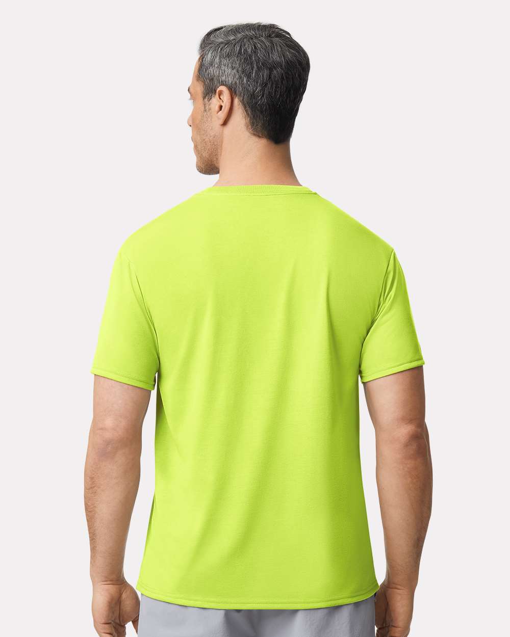 Unisex Performance® T-Shirt - OnModelBack - B09260163 - Safety Green