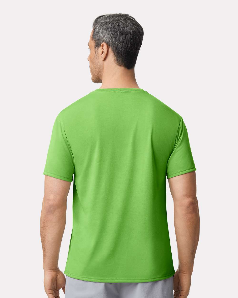 Unisex Performance® T-Shirt - OnModelBack - B09260173 - Lime