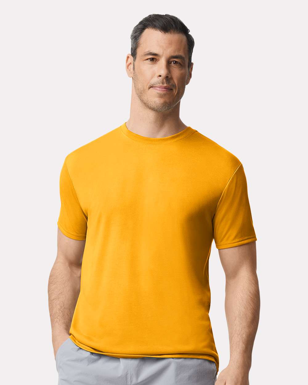 Unisex Performance® T-Shirt - OnModelFront - B09260123 - Gold
